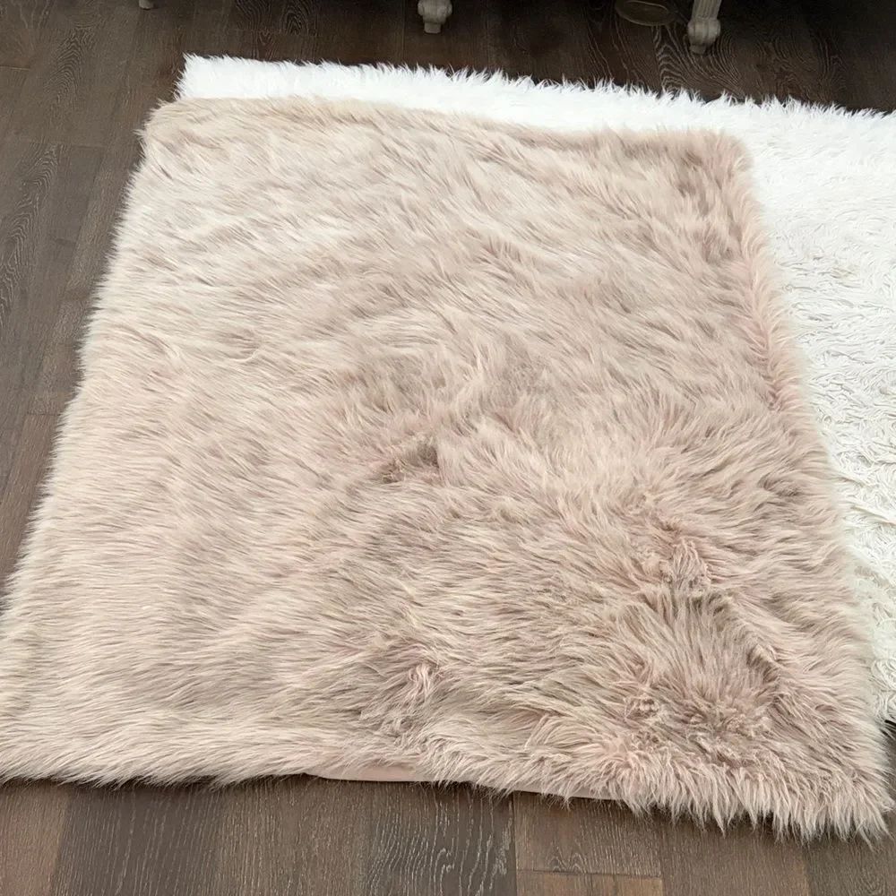 West Elm Soft Faux Furry blanket in Blush Pink